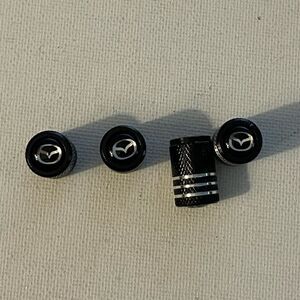 Mazda valve Stem caps in Black set of 4 NWT